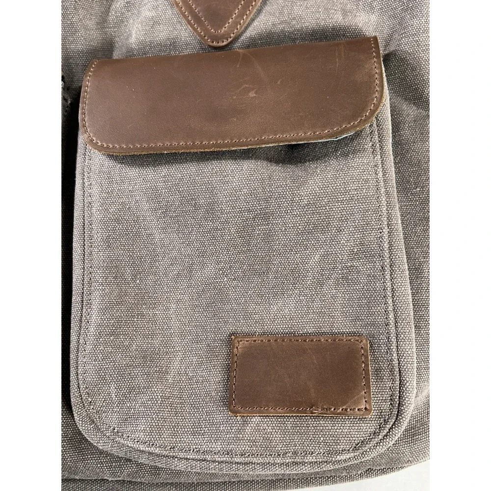 Renwick canvas briefcase featuring genuine leather trim missing shoulder strap